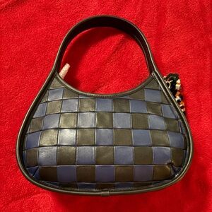 Elegant Black and Blue Woven Coachtopia Handbag